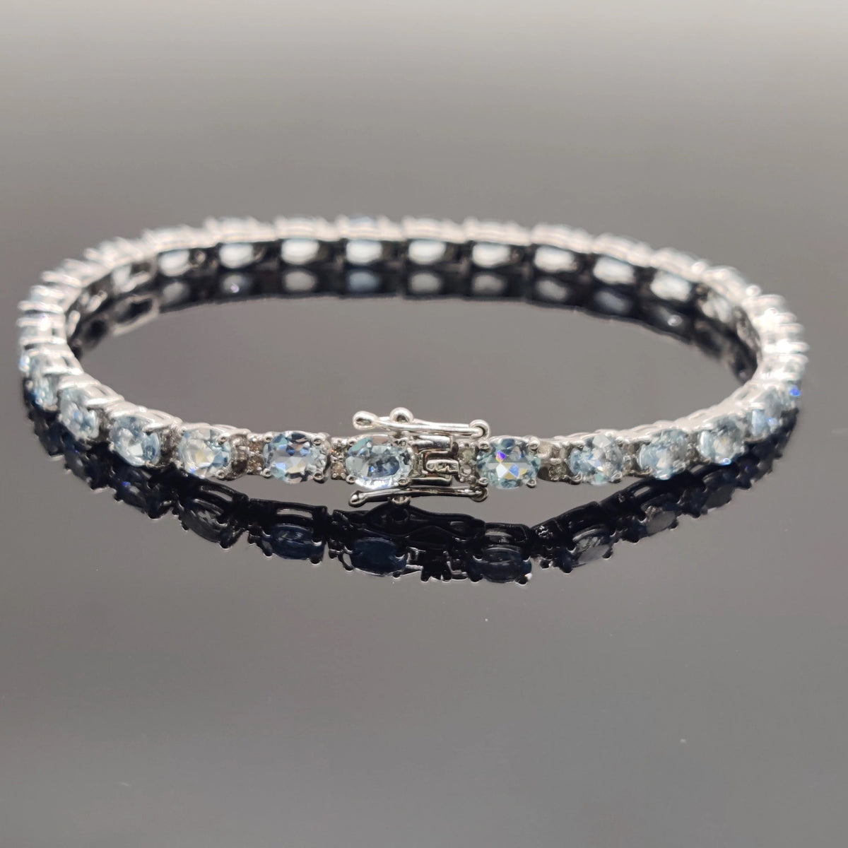 Classic Oval Aquamarine and Diamond Tennis Bracelet